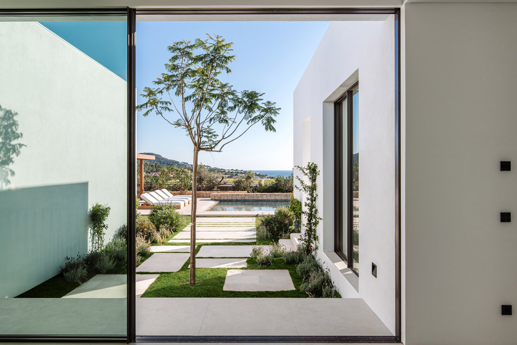 entrada villaunifamiliar viviendas cala tarida ibiza vera architecture